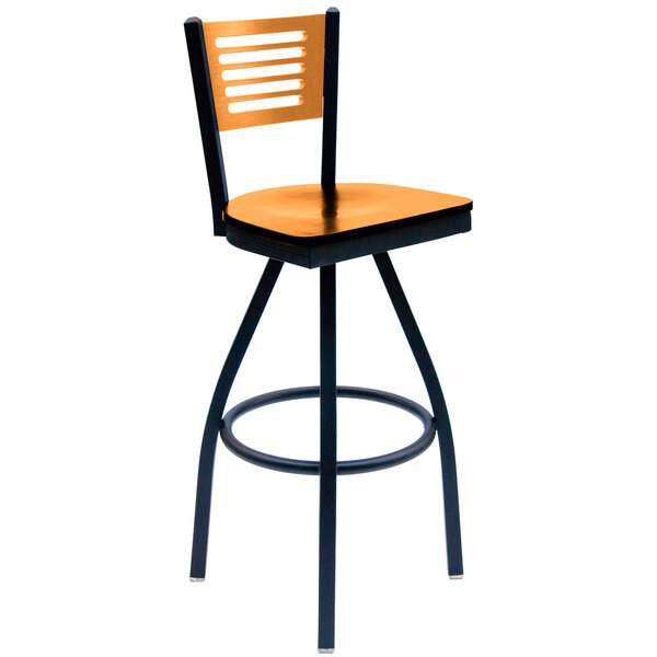 A black metal BFM Seating bar stool with a natural wooden back and swivel seat.