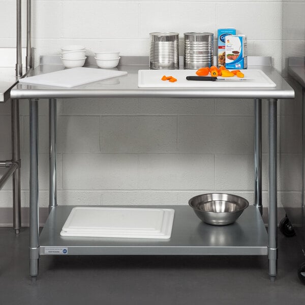 A Steelton stainless steel work table with an undershelf.