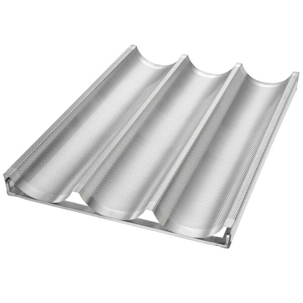 A silver metal Chicago Metallic bread pan with three long compartments with wavy lines.