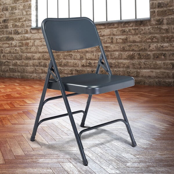 A National Public Seating Char-Blue metal folding chair with a gray seat and back.