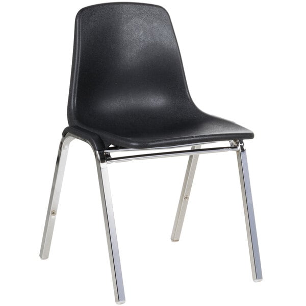 A black plastic National Public Seating stacking chair with chrome legs.