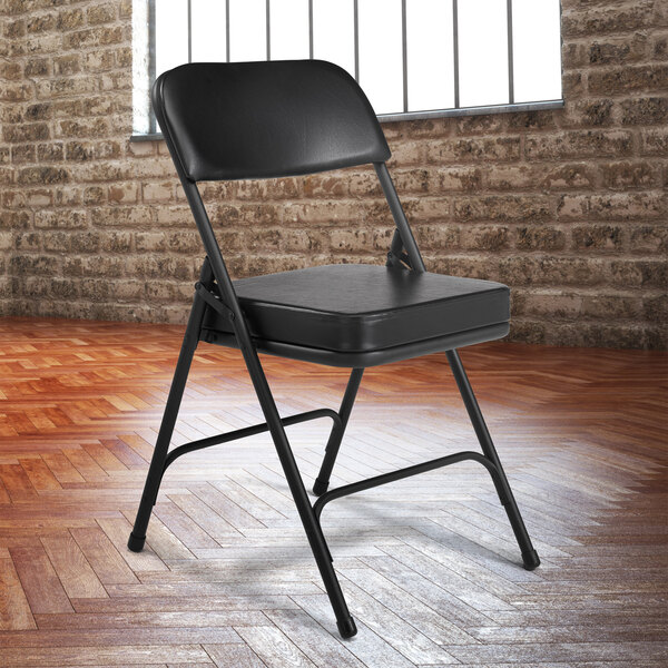National Public Seating 3210 Black Steel Folding Chair with 2" Black Vinyl Padded Back and Seat