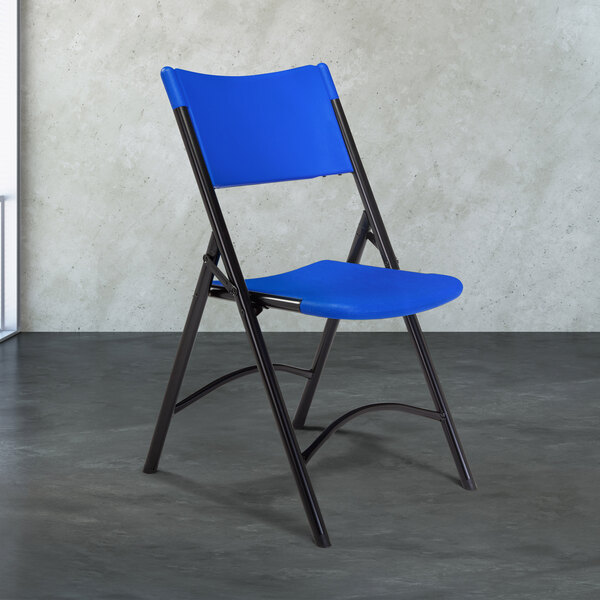 National Public Seating 604 Black Metal Folding Chair with Blue Blow Molded Plastic Back and Seat