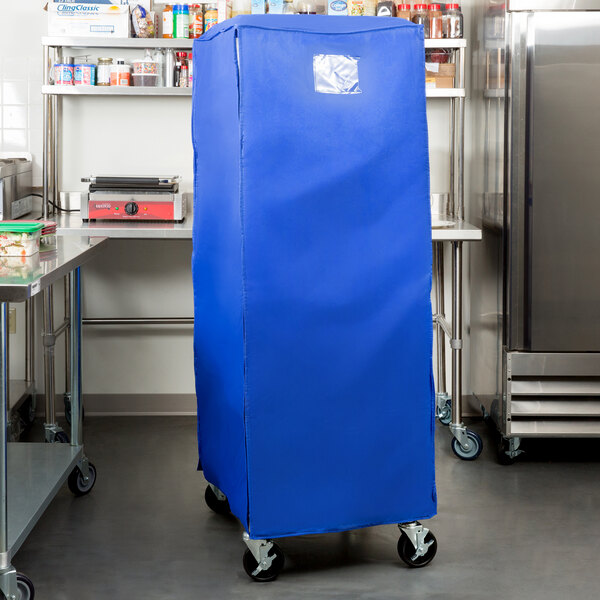 A blue insulated polyester cover designed to fit over a bun pan rack in a commercial kitchen.