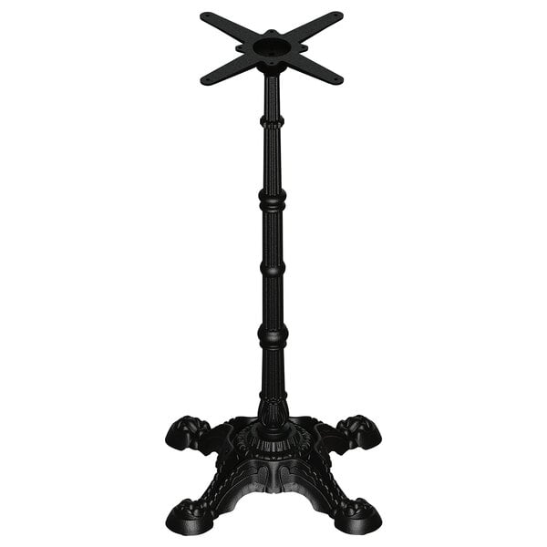 A black FLAT Tech cast iron bar height table base with a star-shaped stand.