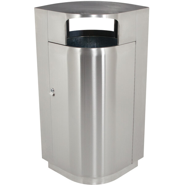A silver stainless steel oval trash receptacle with a leaf design window.