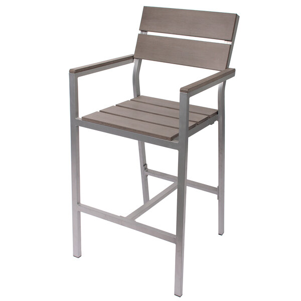 A BFM Seating outdoor bar chair with a synthetic teak seat and back on a metal frame.