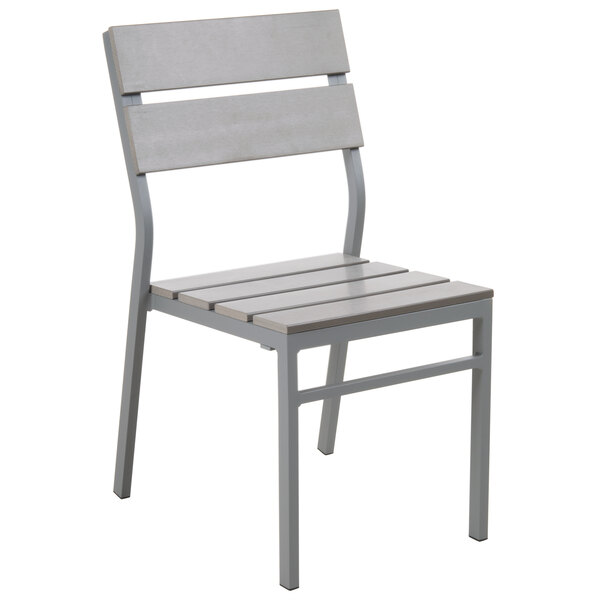 A BFM Seating grey aluminum outdoor restaurant chair with a grey synthetic teak seat and back.