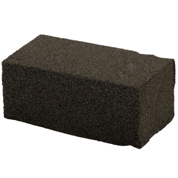 A black Vollrath grill brick.