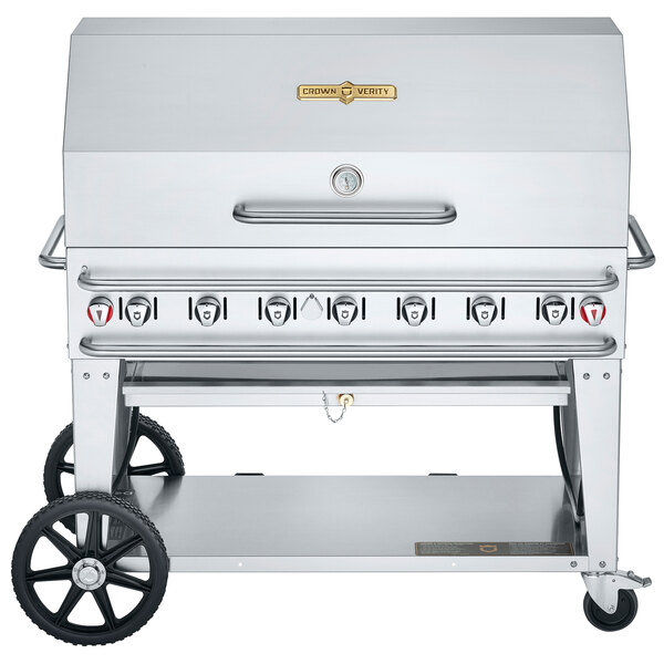 A silver Crown Verity propane barbecue grill on wheels.