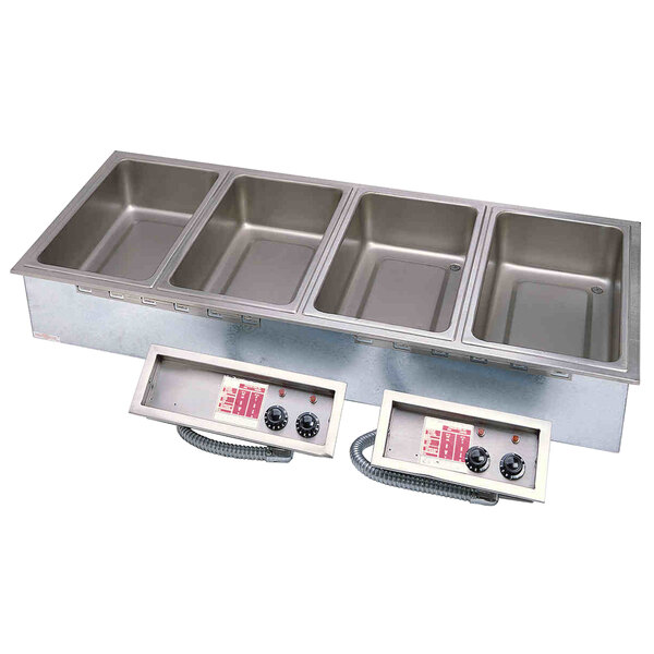 An APW Wyott stainless steel drop-in hot food well with five pans on a counter.