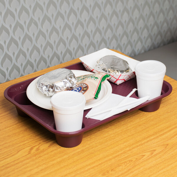 A burgundy GET fast food tray with food and a drink on it.