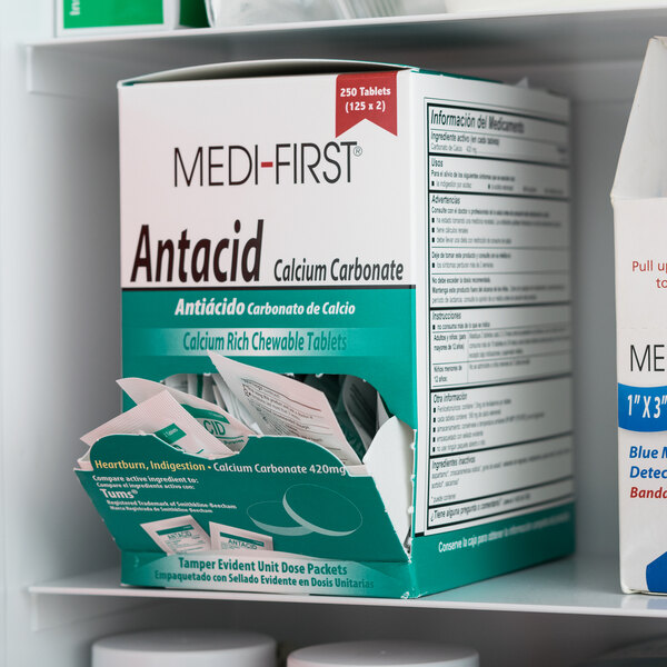 A box of Medi-First antacid tablets.