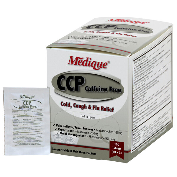 A box of Medique Caffeine Free Headache and Sinus Congestion tablets on a counter.