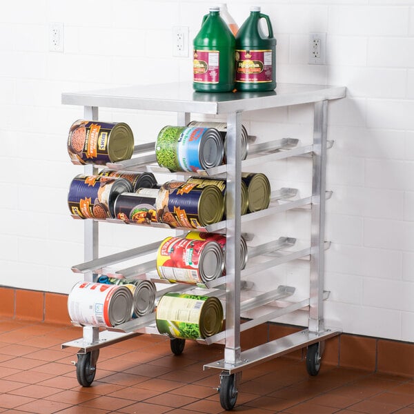 A Regency metal cart with cans on it.