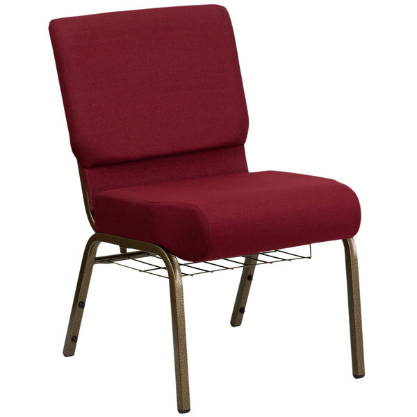 A red church chair with a metal frame and wire rack.