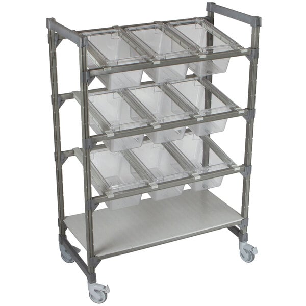 A white Cambro Camshelving® Elements flex station display rack with plastic bins on wheels.