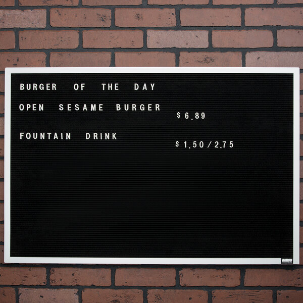 An Aarco black felt message board with white letters reading "Burger of the Day"