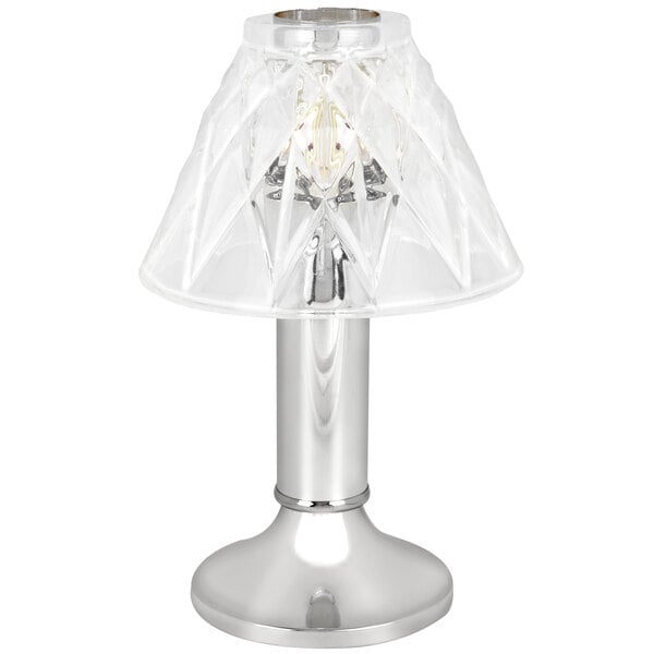 A Sterno Paige chrome table lamp with a clear glass shade.