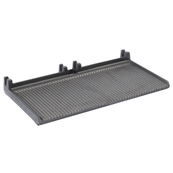 An Avantco grooved bottom grill plate with metal grates.
