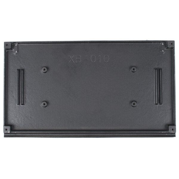 A black rectangular flat grill plate for an Avantco sandwich grill with screw holes.