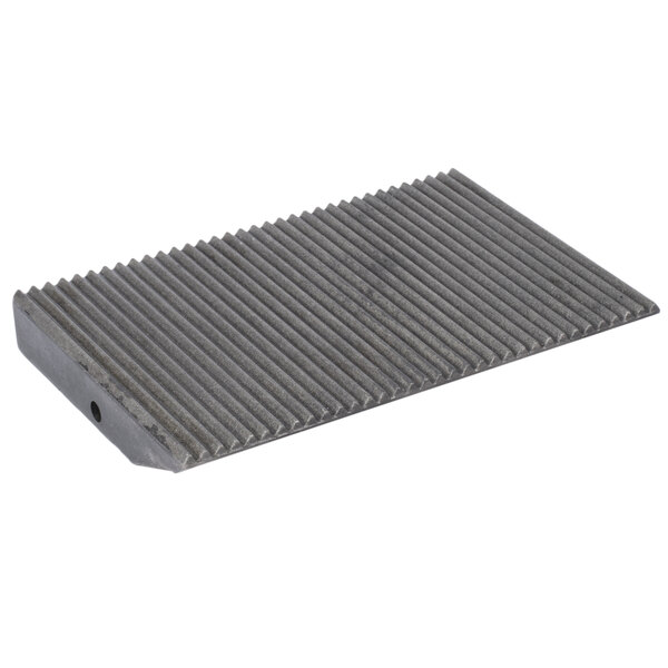 An Avantco grooved top grill plate with a grey metal surface and rectangular shape.