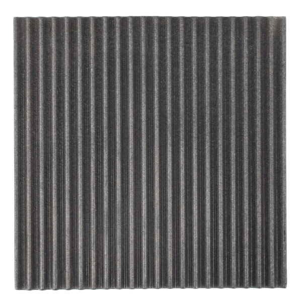 A grey and black grooved top grill plate with a thin metal strip on the left side.