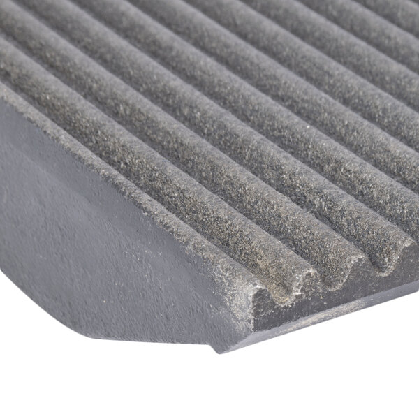 A grey grooved surface on a Avantco left side grill plate.