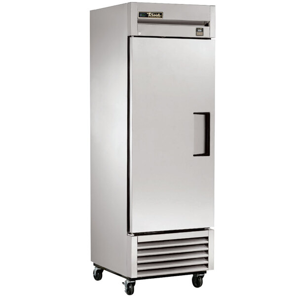 A large stainless steel True reach-in refrigerator with a left-hinged door.