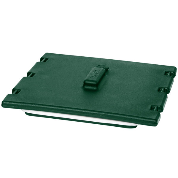 A green plastic lid for a Camtainer with a black handle.