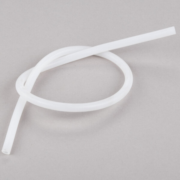 A Carnival King white plastic drain hose with a circular shape.