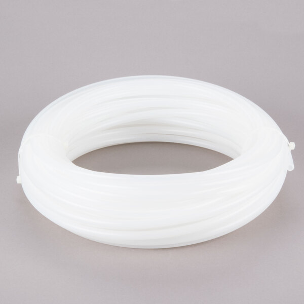 A white plastic Dema 3/8" chemical pickup and supply tube.