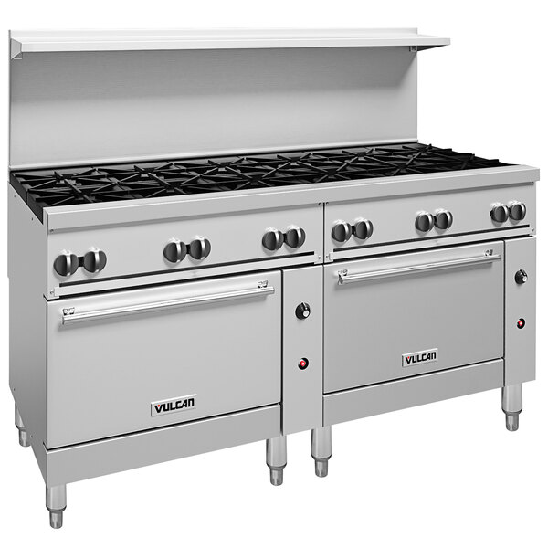 A large stainless steel Vulcan commercial gas range with black knobs over two ovens.