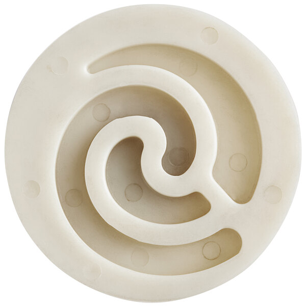 A white circular plastic part with a spiral inside.