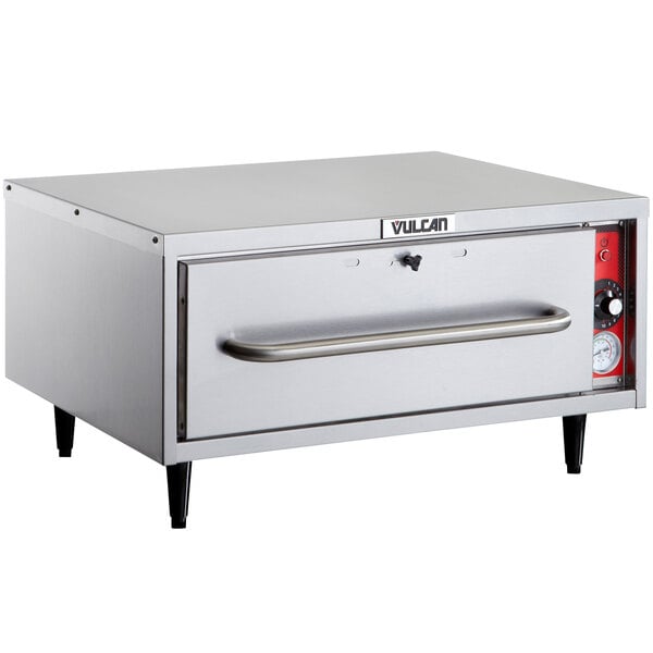 A silver stainless steel Vulcan drawer warmer on a counter.