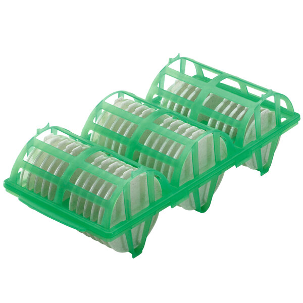 A green plastic Cambro rack with white round objects inside.