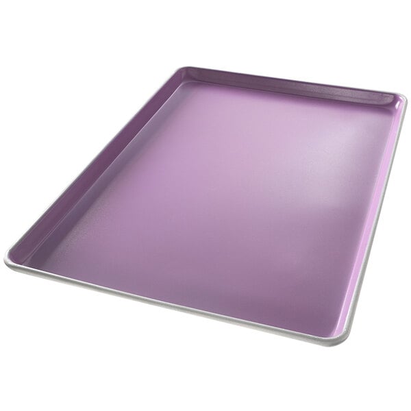 A purple rectangular Chicago Metallic sheet pan with a white border.