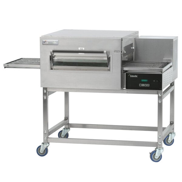 A Lincoln stainless steel ventless conveyor oven with a sliding door.