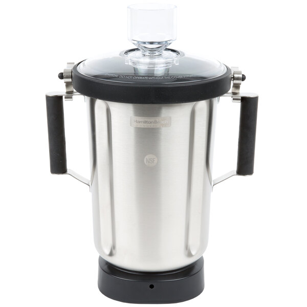 A stainless steel Hamilton Beach blender jar with a stainless steel lid and blade.