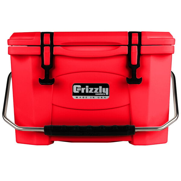 A red Grizzly Cooler with black handles.
