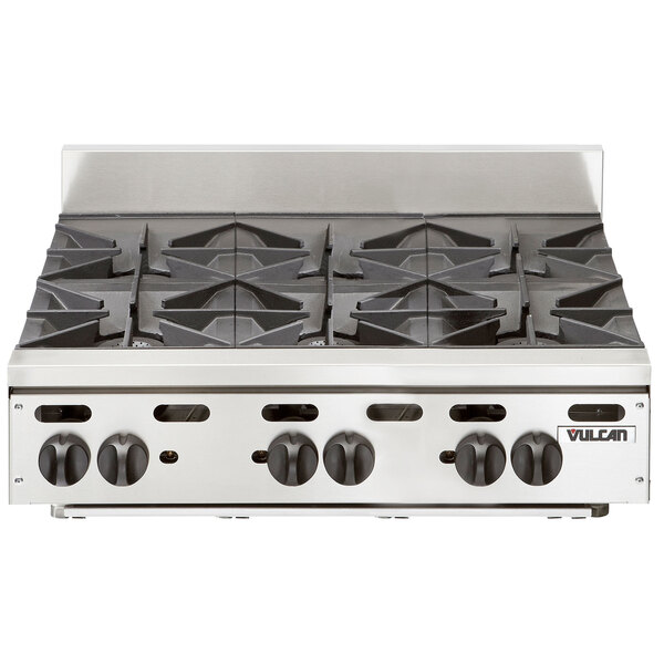 A Vulcan stainless steel countertop gas range with six burners.