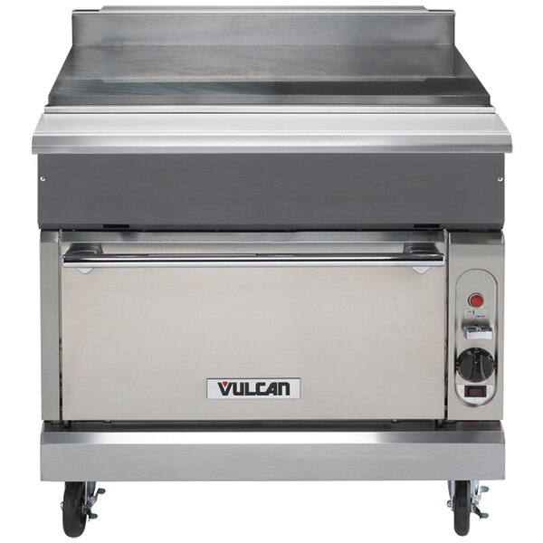 A large stainless steel Vulcan spreader cabinet with a standard oven.