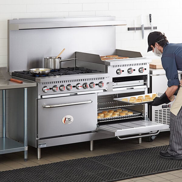 A man cooking on a Cooking Performance Group commercial gas range with griddle and ovens.