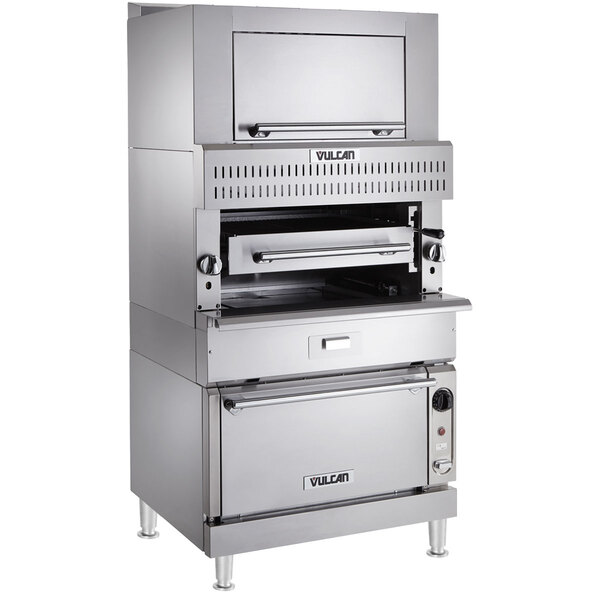 A large stainless steel Vulcan upright broiler with convection and finishing ovens.
