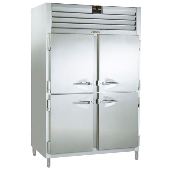 A stainless steel Traulsen holding cabinet and refrigerator with two half doors.