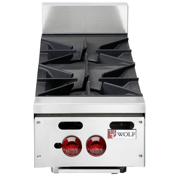 A Wolf stainless steel countertop range with two burners.