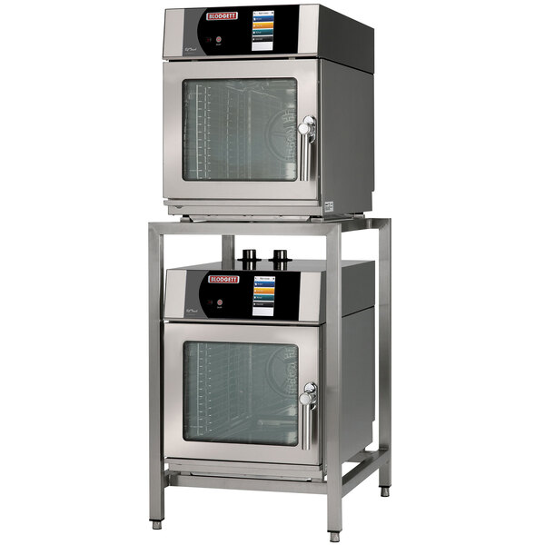 A stack of stainless steel Blodgett double mini boilerless electric combi ovens.