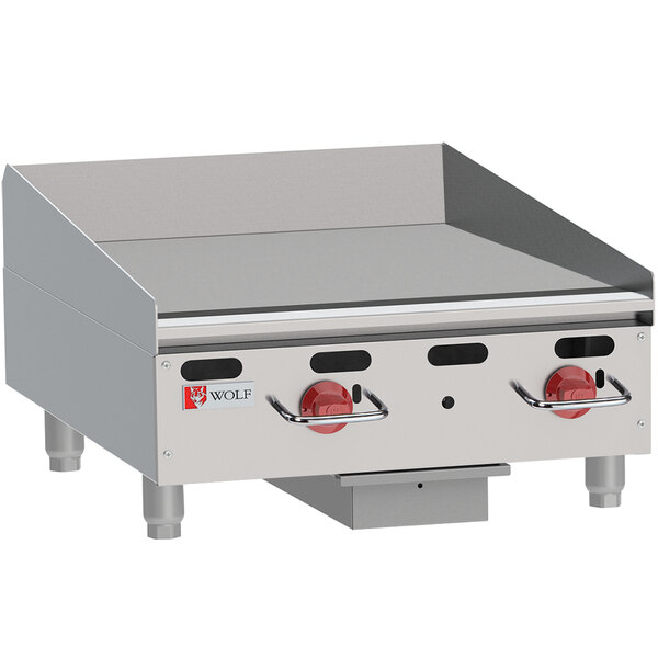 A Wolf liquid propane gas countertop griddle with manual controls.