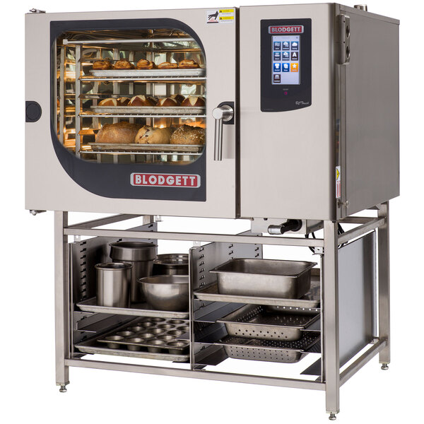 A Blodgett natural gas combi oven with metal trays of food on shelves.