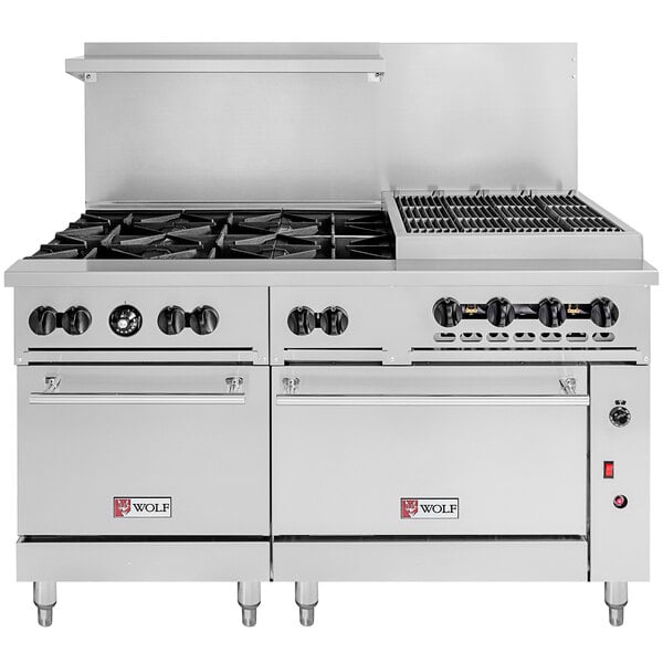 A Wolf stainless steel commercial gas range with 6 burners, a charbroiler, and 2 ovens.
